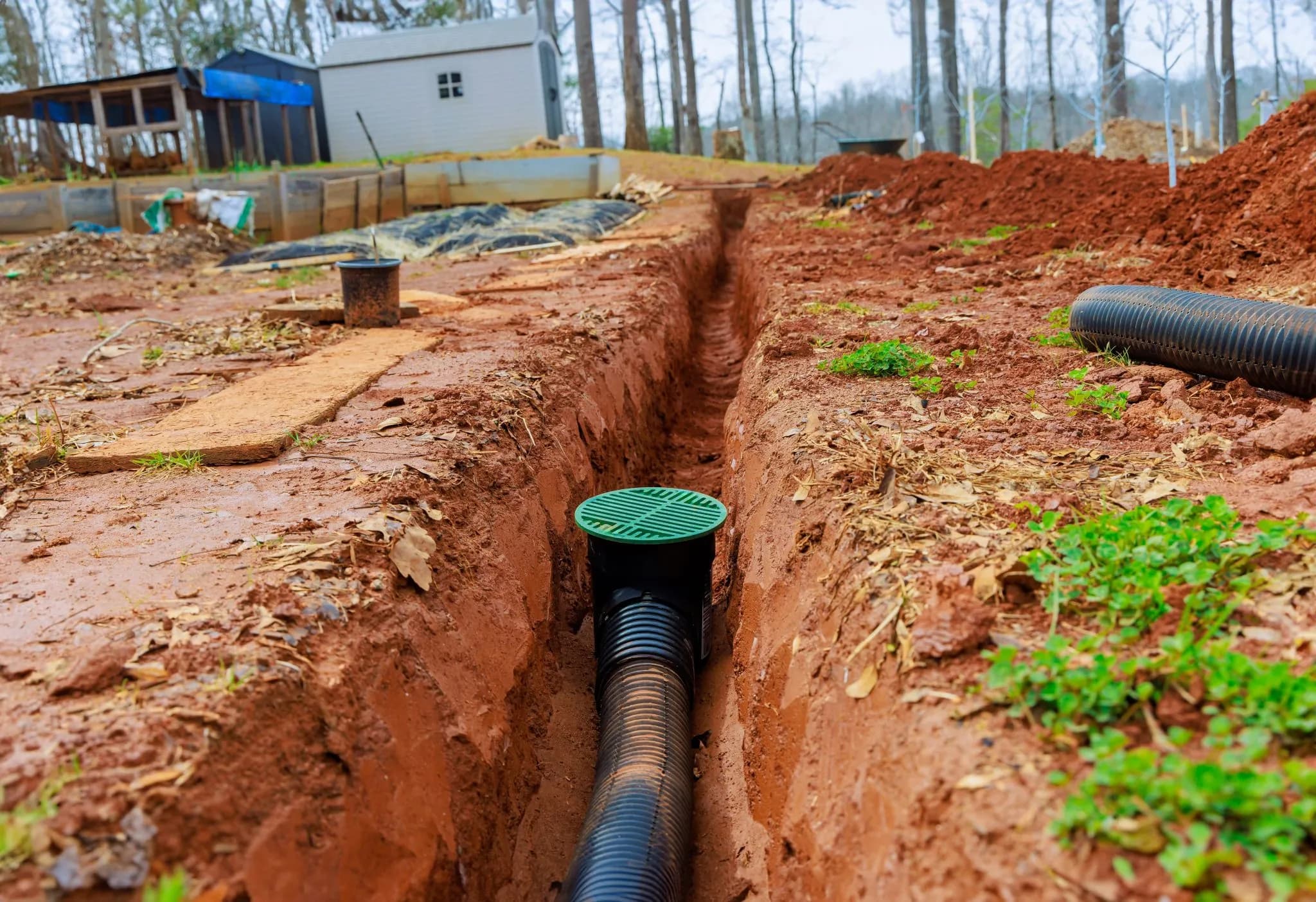 French drain trench installation for yard drainage in Anne Arundel County