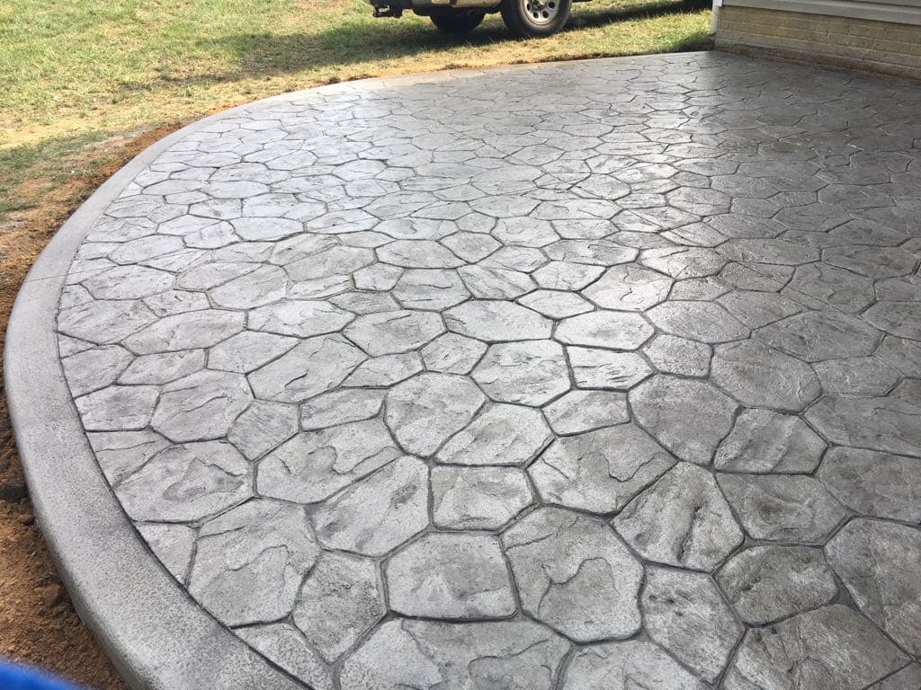 Random stone stamped concrete pattern sample